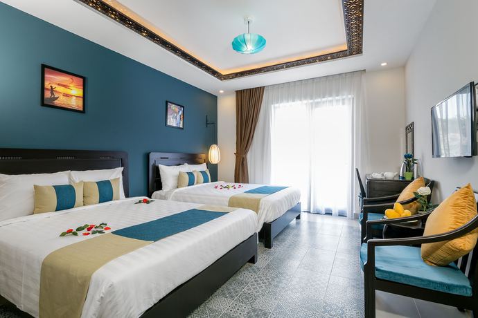Imagen de la habitación del Hotel Hoi An Golden Holiday Villa. Foto 9