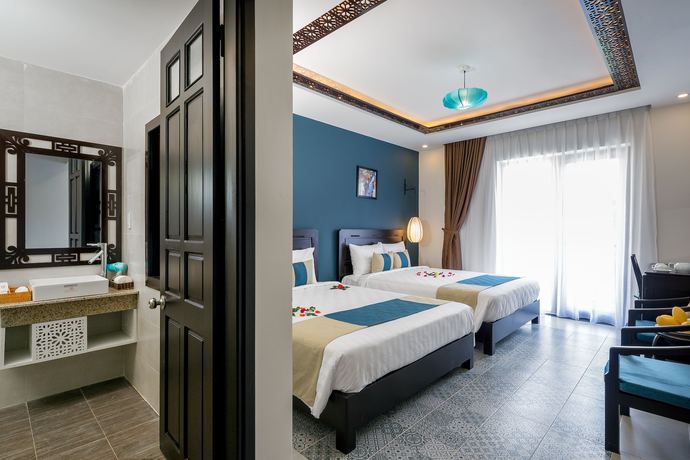 Imagen de la habitación del Hotel Hoi An Golden Holiday Villa. Foto 18