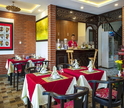 Imagen del bar/restaurante del Hotel Hoi An Riverland Villa. Foto 18