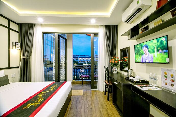 Imagen de la habitación del Hotel Hoi An Riverland Villa. Foto 19