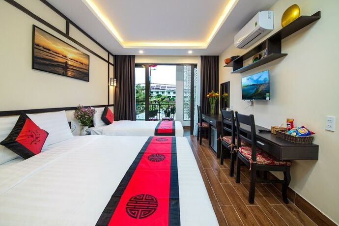 Imagen de la habitación del Hotel Hoi An Riverland Villa. Foto 26