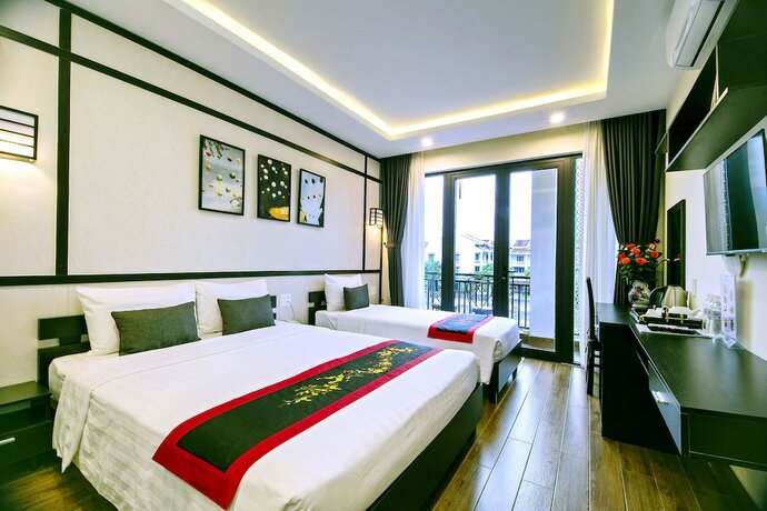 Imagen de la habitación del Hotel Hoi An Riverland Villa. Foto 27