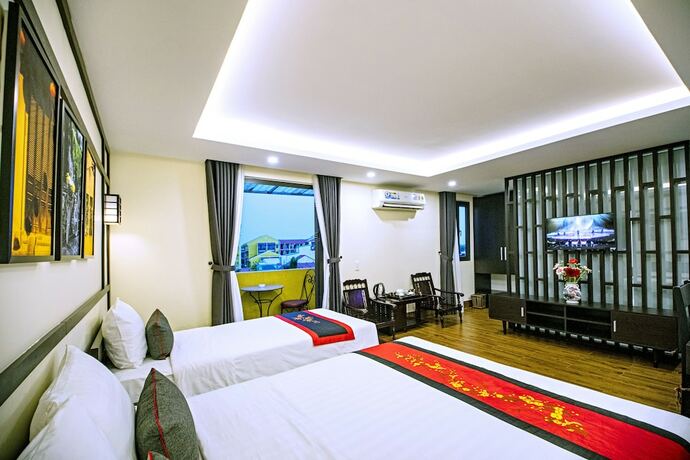 Imagen de la habitación del Hotel Hoi An Riverland Villa. Foto 32