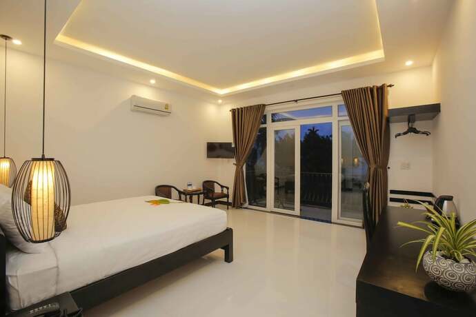 Imagen de la habitación del Hotel Hoi An Sunny Pool Villa. Foto 14