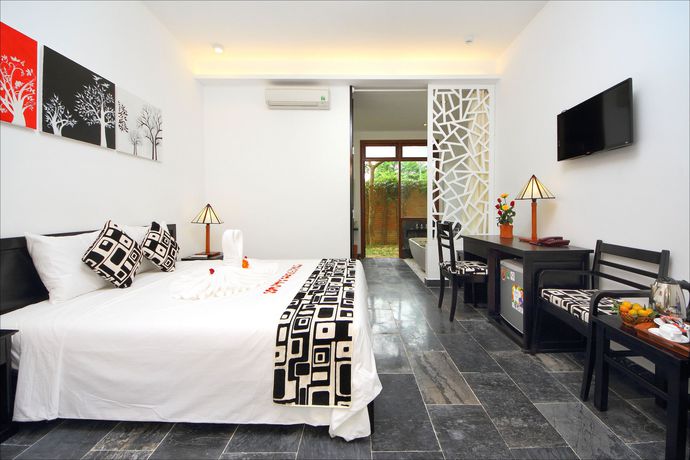Imagen de la habitación del Hotel Hoi An Tnt Villa. Foto 6