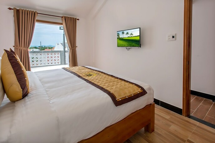 Imagen de la habitación del Hotel Hoi An Vi Khoa Villa. Foto 16