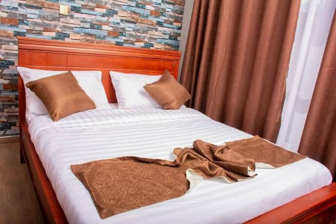 Imagen de la habitación del Hotel Hoima Breeze. Foto 16