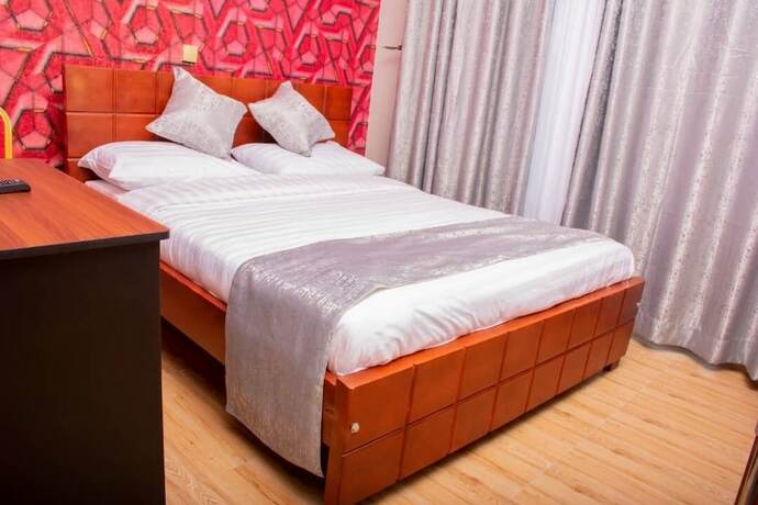 Imagen de la habitación del Hotel Hoima Breeze. Foto 17