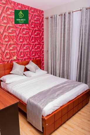 Imagen de la habitación del Hotel Hoima Breeze. Foto 19