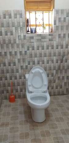 Imagen de la habitación del Hotel Hoima Breeze. Foto 7