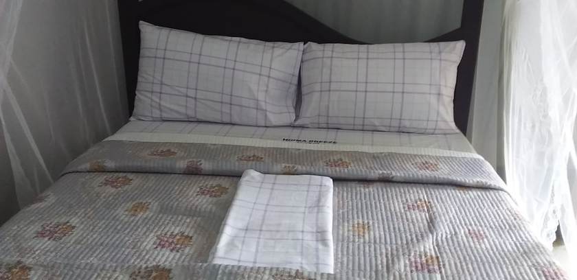 Imagen de la habitación del Hotel Hoima Breeze. Foto 8