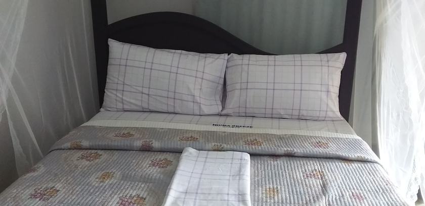 Imagen de la habitación del Hotel Hoima Breeze. Foto 15