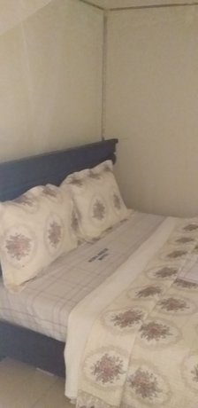 Imagen de la habitación del Hotel Hoima Breeze. Foto 16