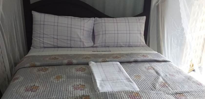 Imagen de la habitación del Hotel Hoima Breeze. Foto 17