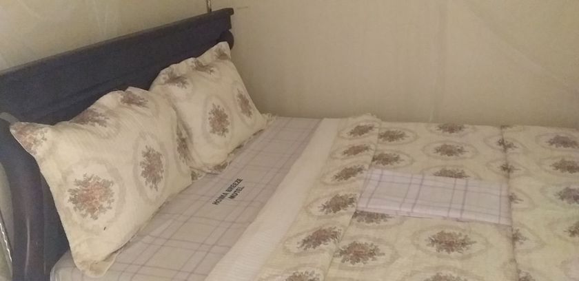 Imagen de la habitación del Hotel Hoima Breeze. Foto 18