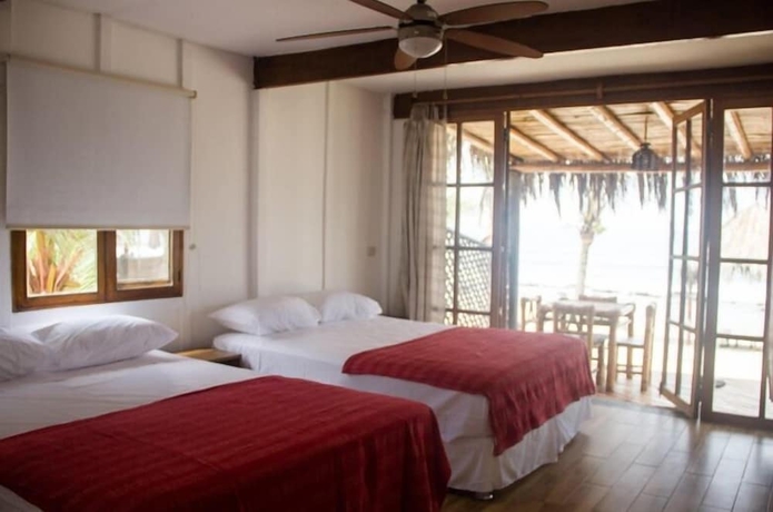 Imagen de la habitación del Hotel Hoja de Palma Bungalows. Foto 5