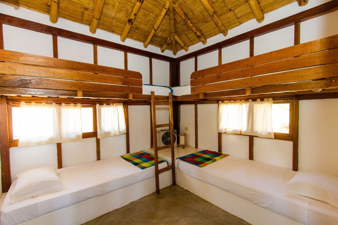 Imagen de la habitación del Hotel Hoja de Palma Bungalows. Foto 6