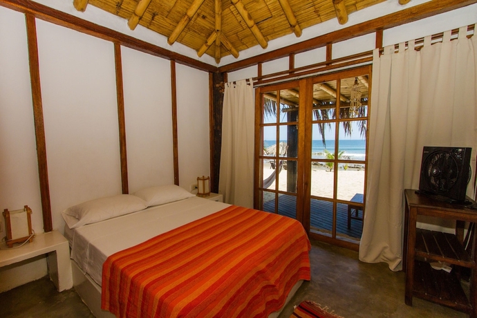 Imagen de la habitación del Hotel Hoja de Palma Bungalows. Foto 7