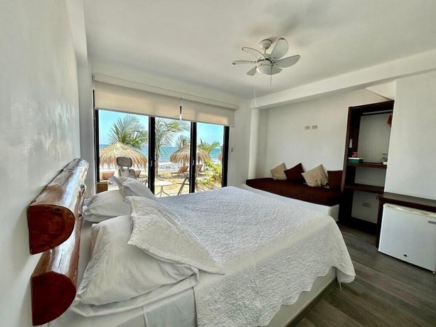 Imagen de la habitación del Hotel Hoja de Palma Bungalows. Foto 11