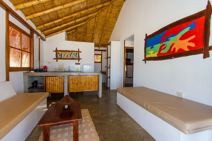 Imagen de la habitación del Hotel Hoja de Palma Bungalows. Foto 17