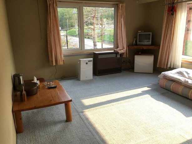 Imagen de la habitación del Hotel Hokuseiso. Foto 13