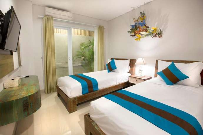Imagen de la habitación del Hotel Hola Seminyak. Foto 7