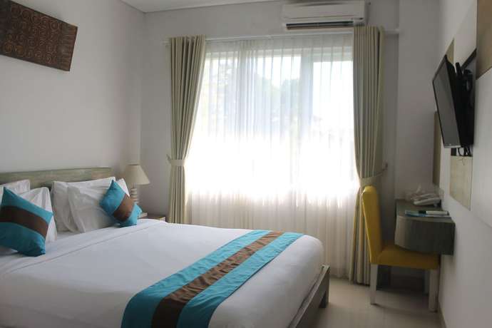Imagen de la habitación del Hotel Hola Seminyak. Foto 9