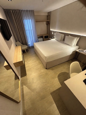 Imagen de la habitación del Hotel Holanda Gold Praia de Tamba&uacute;. Foto 7