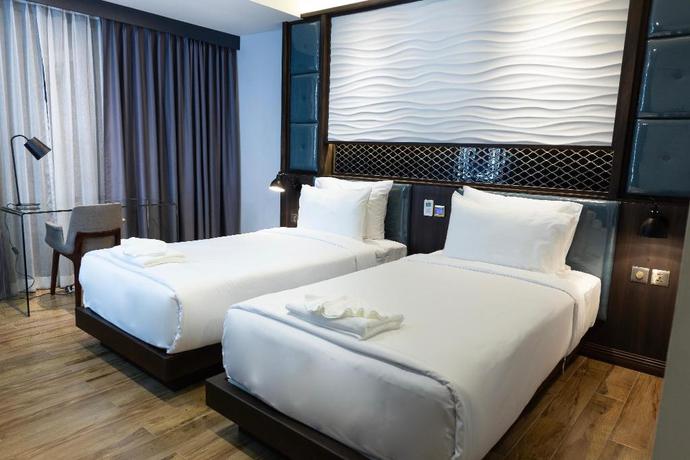 Imagen de la habitación del Hotel Holatel Phitsanulok. Foto 5