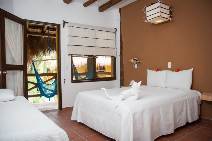 Imagen de la habitación del Hotel Holbox Dream Beach Front. Foto 7