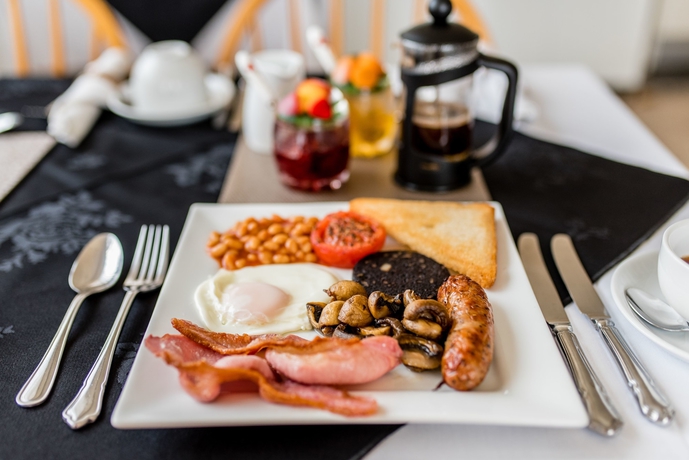 Imagen del bar/restaurante del Hotel Holcombe Guest House. Foto 6