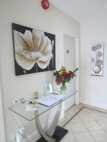 Imagen de los interiores del Hotel Holcombe Guest House. Foto 19