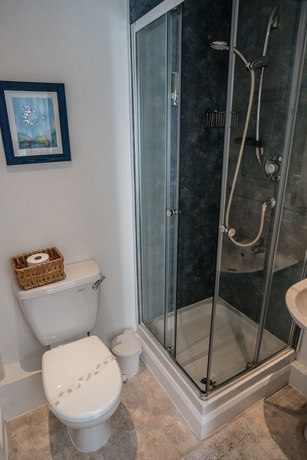 Imagen de la habitación del Hotel Holcombe Guest House. Foto 13