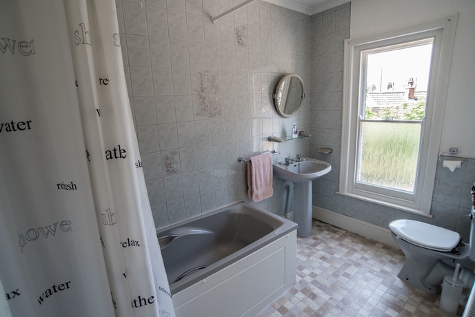 Imagen de la habitación del Hotel Holcombe Guest House. Foto 14