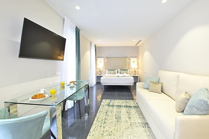 Imagen de la habitación del Hotel HoliHome Rambla 24. Foto 15
