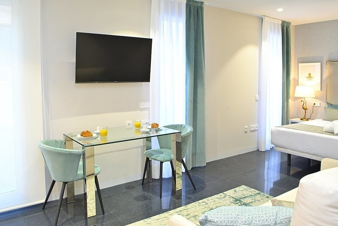 Imagen de la habitación del Hotel HoliHome Rambla 24. Foto 17