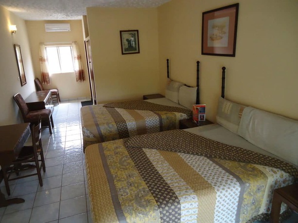 Imagen de la habitación del Hotel Holiday Beach Club. Foto 5