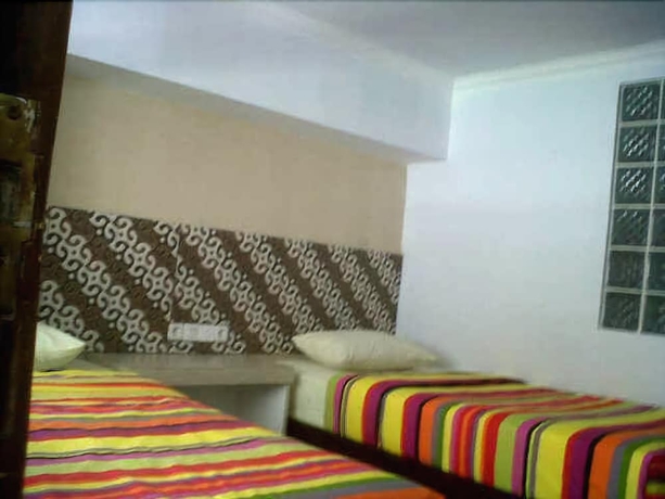 Imagen de la habitación del Hotel Holiday Beach Inn. Foto 2