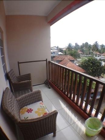 Imagen de la habitación del Hotel Holiday Beach Inn. Foto 7