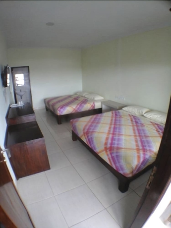 Imagen de la habitación del Hotel Holiday Beach Inn. Foto 14