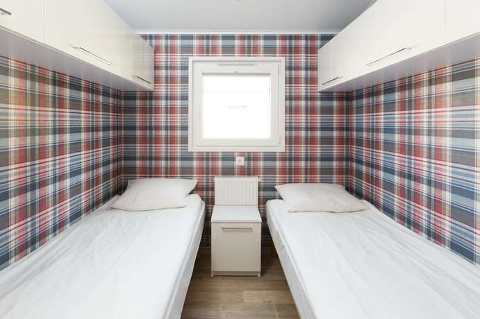 Imagen de la habitación del Hotel Holiday Camping Resort Domki Lazy. Foto 14