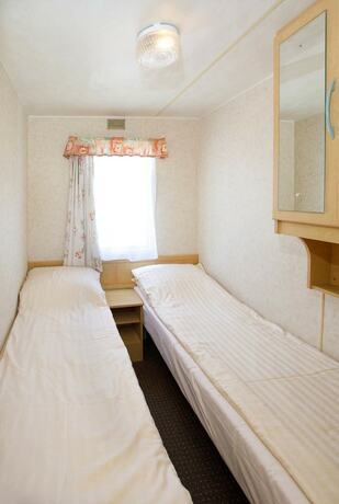 Imagen de la habitación del Hotel Holiday Camping Resort Domki Lazy. Foto 19