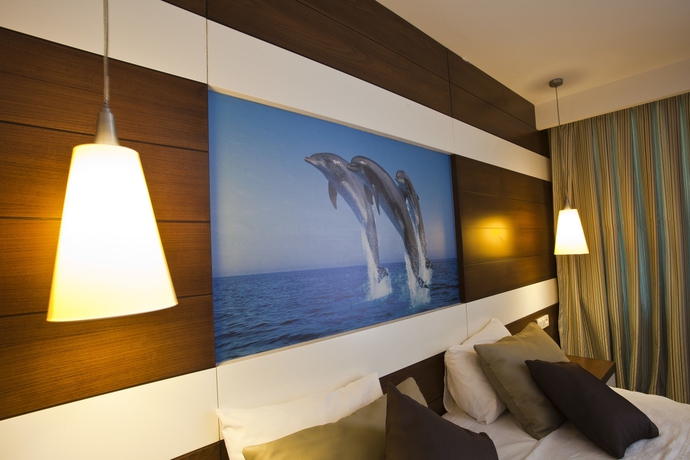 Imagen de la habitación del Hotel Holiday City. Foto 6