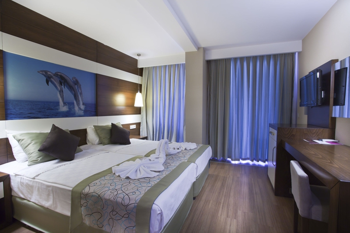 Imagen de la habitación del Hotel Holiday City. Foto 7