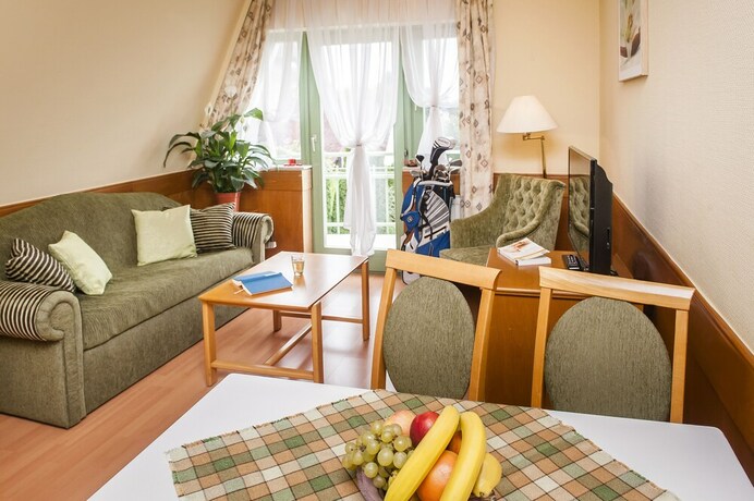 Imagen de la habitación del Hotel Holiday Club Apartman. Foto 5