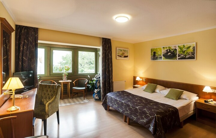 Imagen de la habitación del Hotel Holiday Club Apartman. Foto 7