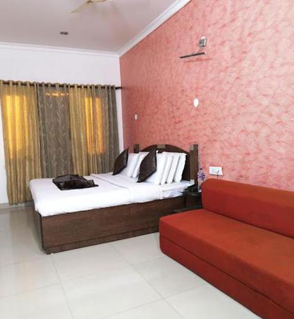 Imagen de la habitación del Hotel Holiday Comfort Amritsar. Foto 20