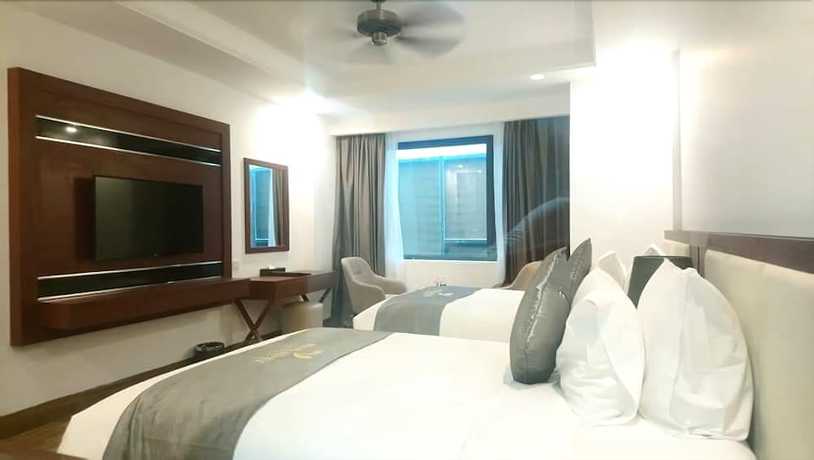 Imagen de la habitación del Hotel Holiday Cua Lo. Foto 9