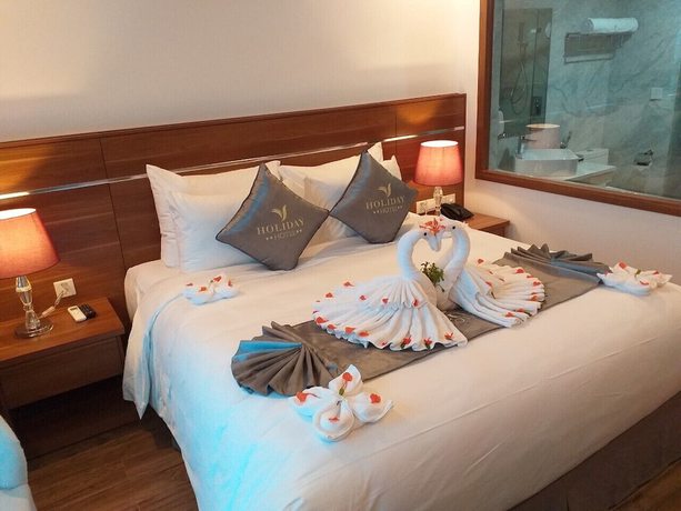 Imagen de la habitación del Hotel Holiday Cua Lo. Foto 12