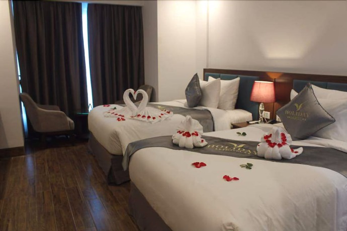 Imagen de la habitación del Hotel Holiday Cua Lo. Foto 15